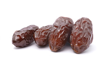 Dried date palm fruit isolated on white background with clipping path. dry fruit concept.