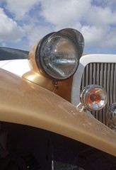 luxury retro car with round headlights