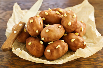 Chocolate cake with cream in the form of potatoes.