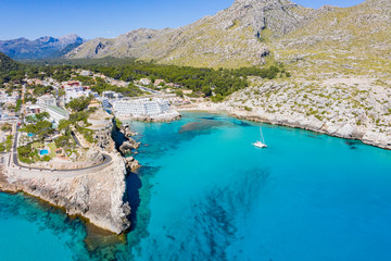 Obraz premium Cala San Vicente on a wonderful sunny day with crystal clear waters.