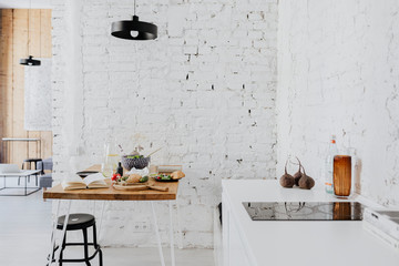 Minimal dining table with a cookbook