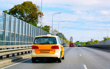 Taxi car on road in Jurmala reflex