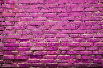 Fototapeta na wymiar Violet color old brick wall background