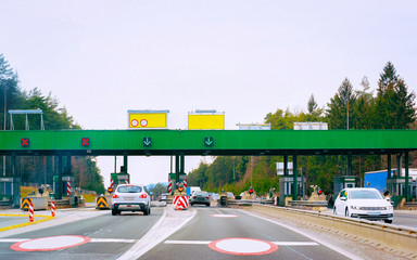 Cars at Toll booth on road in Slovenia reflex