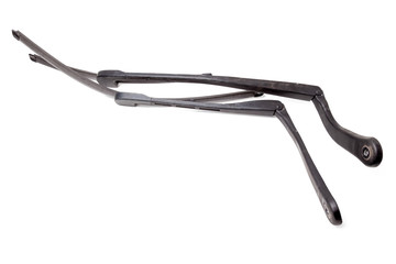 A pair of black plastic wipers on a white isolated background with rubber brushes for cleaning from dirt, dust or rain without hampering the driver's visibility. Spare part for the car at the parsing.