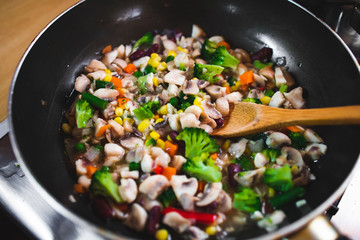 Top view of pan with mix vegetables. Preparing a vegan meal