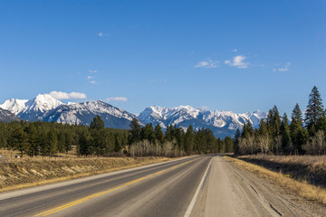 Highway to rocky mountains and blue sky East Kootenay british columbia canada.