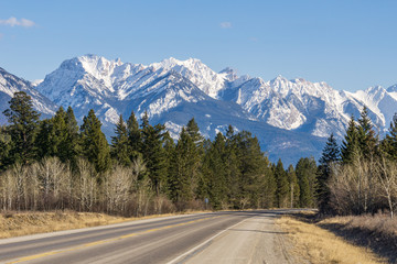 Fototapeta na wymiar Highway to rocky mountains and blue sky East Kootenay british columbia canada.