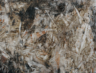close up of dirty pressed wood chips