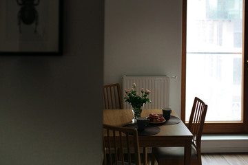 Croissants, flowers, and morning coffee in the kitchen