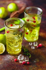 Lime Lemonade with thyme, cranberry and ice.