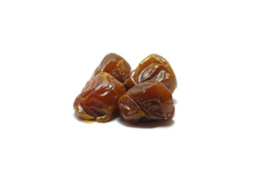 Four pieces of sukkari dates (kurma sukari) isolated on white background, perfect for breakfasting during ramadan