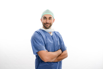 portrait of an handsome man male surgeon wearing surgical scrub suit studio shot isolated on white background