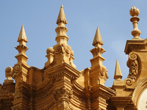 Detail of umbrellas and torchs pinnacles. Cathedral of Guadix. Spain.