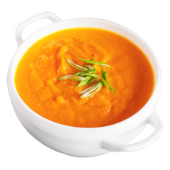 Carrot ginger cream soup, isolated on white