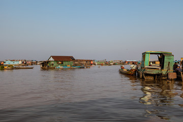 Floating Houses on Tonle Sap lake in the evening in Cambodia