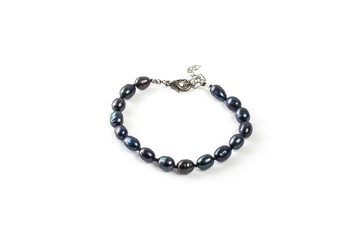 Black pearl bracelet on a white background isolate
