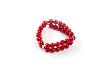 Coral bracelet on a white background isolate