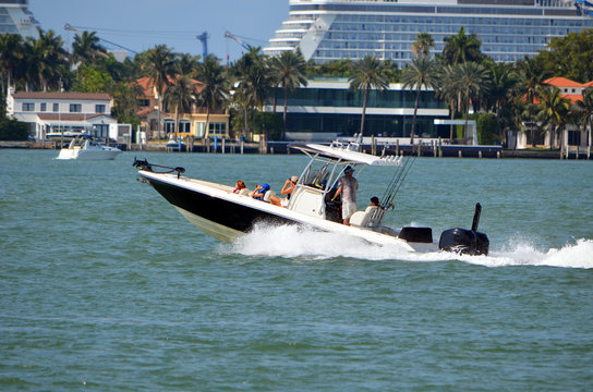 Family Outing On The Florida Intra-Coastal Waterway In An Open Sports Fishing Boat