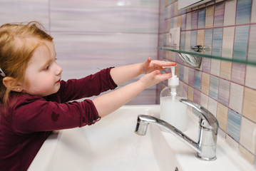 Washing hands and hygiene. Prevention of Coronavirus, flu disease. Child, kid wash hands with antibacterial soap, warm water rubbing nails and fingers in sink. Covid-19. To stop spreading coronavirus.