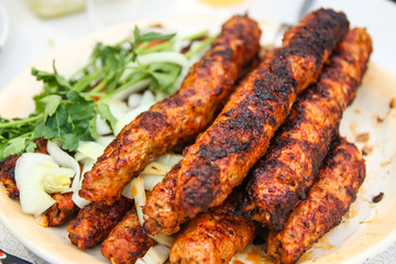 BBQ Beef Kebabs on a Hot Grill Closeup. Arabian and Iranian kabab.