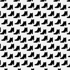 Pattern of boots. Seamless background.