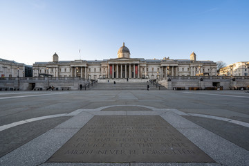 Fototapeta na wymiar LONDON, UK - 23 MARCH 2020: Empty streets at the National Gallery Trafalgar Square, London City Centre during COVID-19, lockdown during coronavirus