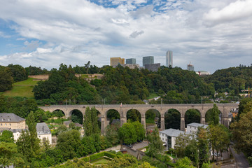 Fototapeta na wymiar Partial view of the city of Luxembourg and its old fortified medieval city that is located on steep cliffs.