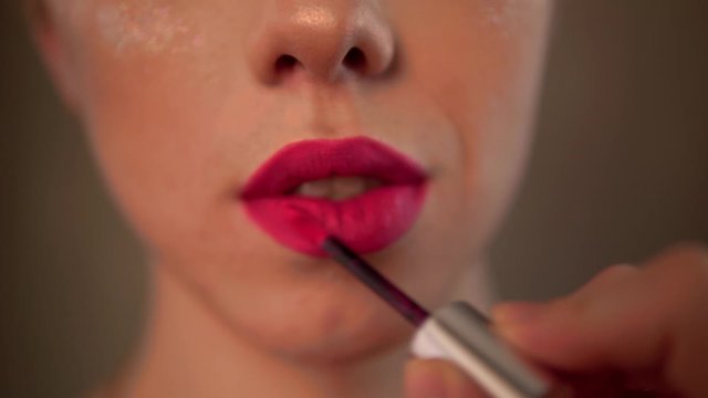 Pink lipstick, homosexual man with bright makeup, transvestite, travesti diva