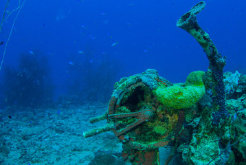 A telegraph amidst wreckage from a Japanese WWII ship that was sunk in Chuuk Lagoon. image taken by a scuba diver