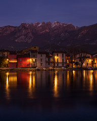 Fototapeta premium Spectacular night reflections of houses on the lake. 