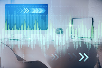 Multi exposure of stock market chart drawing and office interior background. Concept of financial analysis.