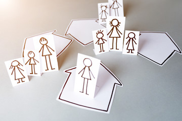 children leaving home with adults in confinement time on cardboard