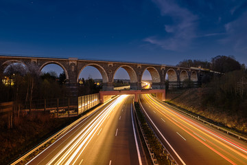 Railway bridge at night long time exposure autobahn, Chemnitz, European Capital of Culture 2025,...