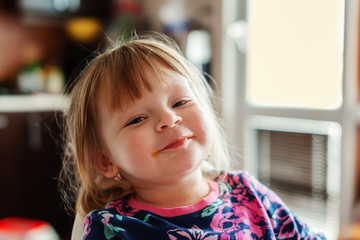 happy eating toddler girl