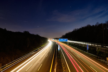 Fototapeta na wymiar Traffic on highway at night long time exposure, Chemnitz, European Capital of Culture 2025, Germany