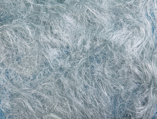 Light blue silk threads background 