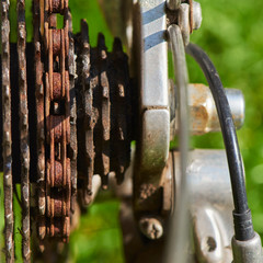 Macro shot of details of a neglected bike that needs urgent maintenance and repair.