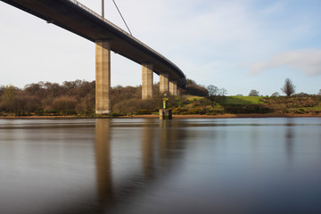 A view of the Erskine bridge over the river clyde on a spring morning in Scotland.