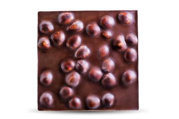 Dark chocolate with hazelnuts on a white isolated background