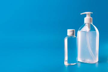 Alcohol Gel to prevention coronavirus. hand sanitizer soap. blue background