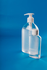 Alcohol Gel to prevention coronavirus. hand sanitizer soap. blue background