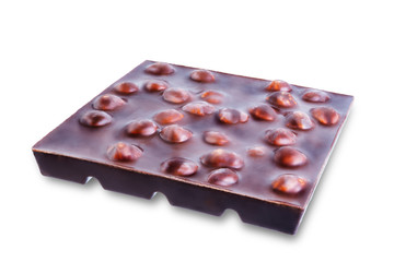 Dark chocolate with hazelnuts on a white isolated background