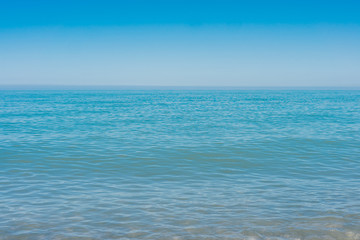 Obraz na płótnie Canvas Blue sea waves soft surface