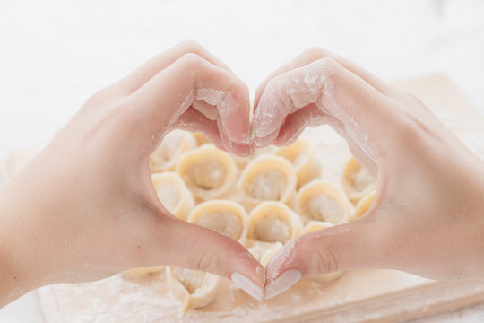 hands, hand symbol heart, heart, Russian dumplings.I love dumplings