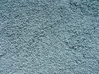 
The surface of the wall of the building. Blurred defocused background for web design.