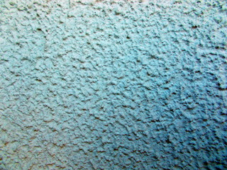 
The surface of the wall of the building. Blurred defocused background for web design.