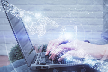 Double exposure of woman hands working on computer and data theme hologram drawing. Tech concept.