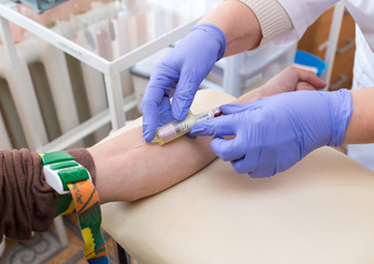 Obraz premium blood sampling from a vein