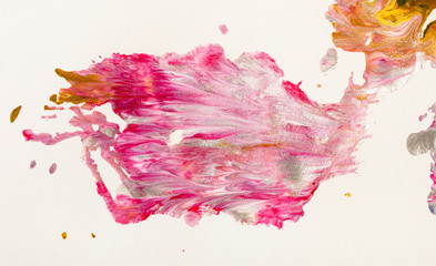 pink blot of acrylic paint on white paper